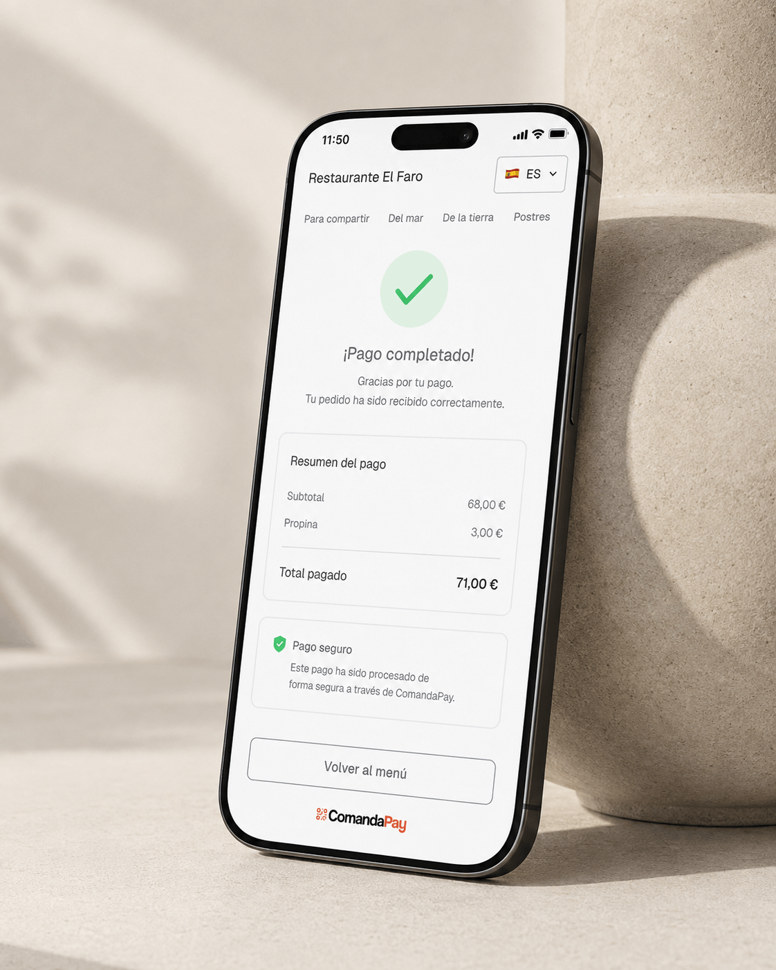 Un móvil muestra un pago de ComandaPay completado correctamente.